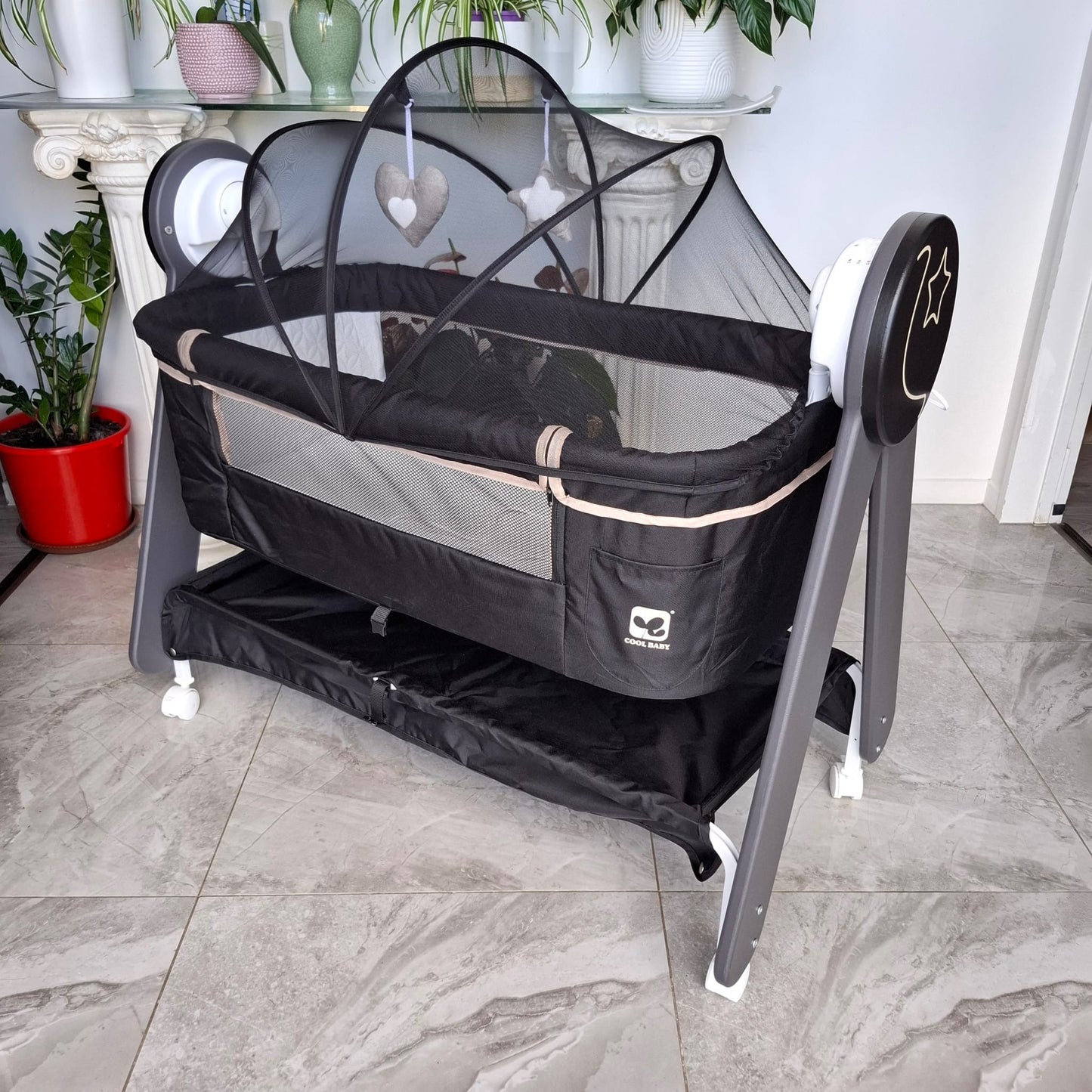 Automatic Rocking Bassinet with Blue Tooth, Music and Night Light in Black
