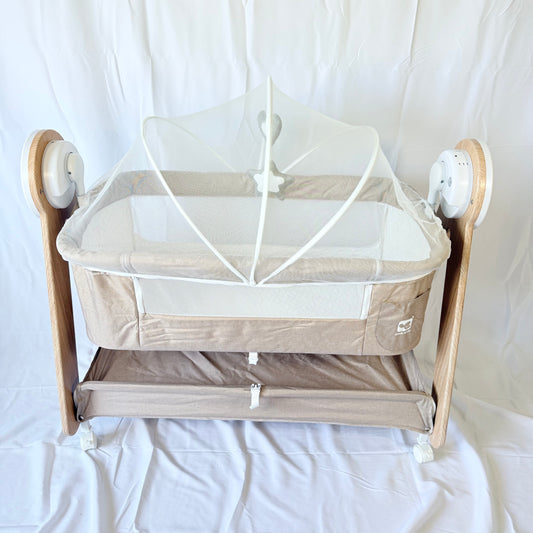 Arête electric rocking cosleeper bassinet in beige with wood-grain frame