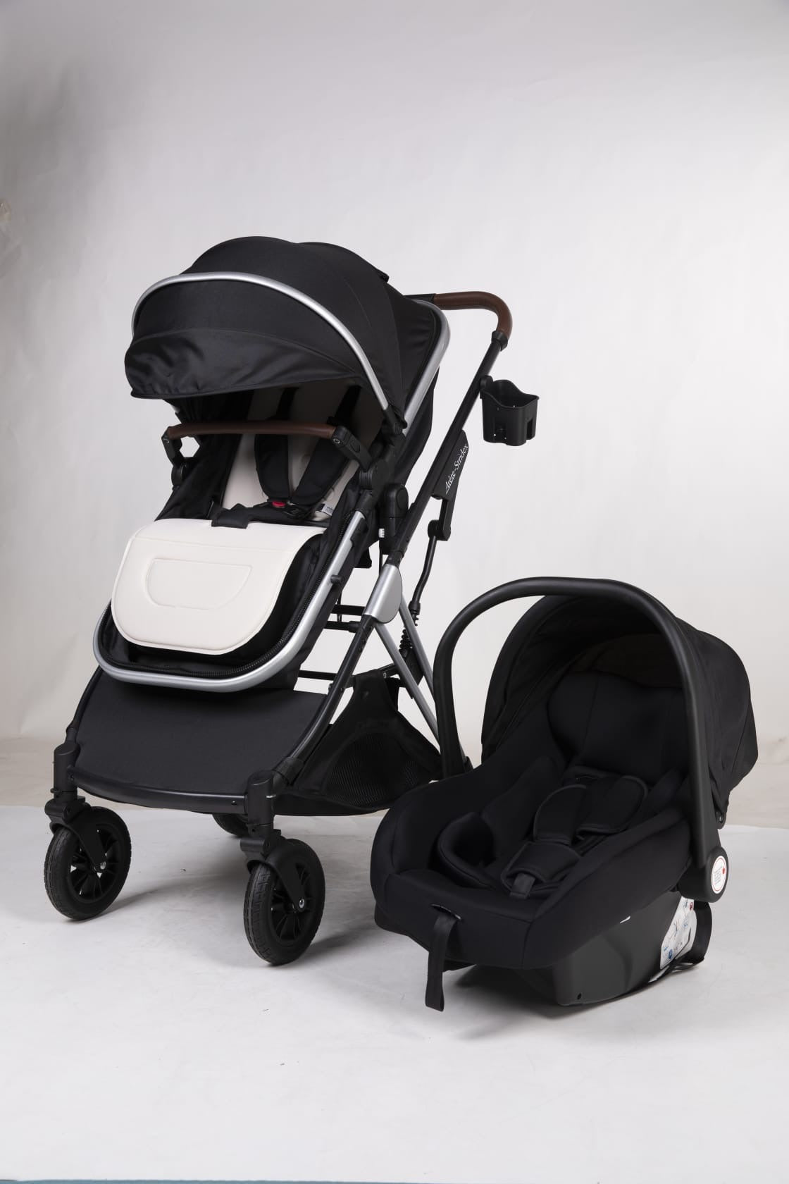 Arête Stridex 3-in-1 travel system in black with capsule