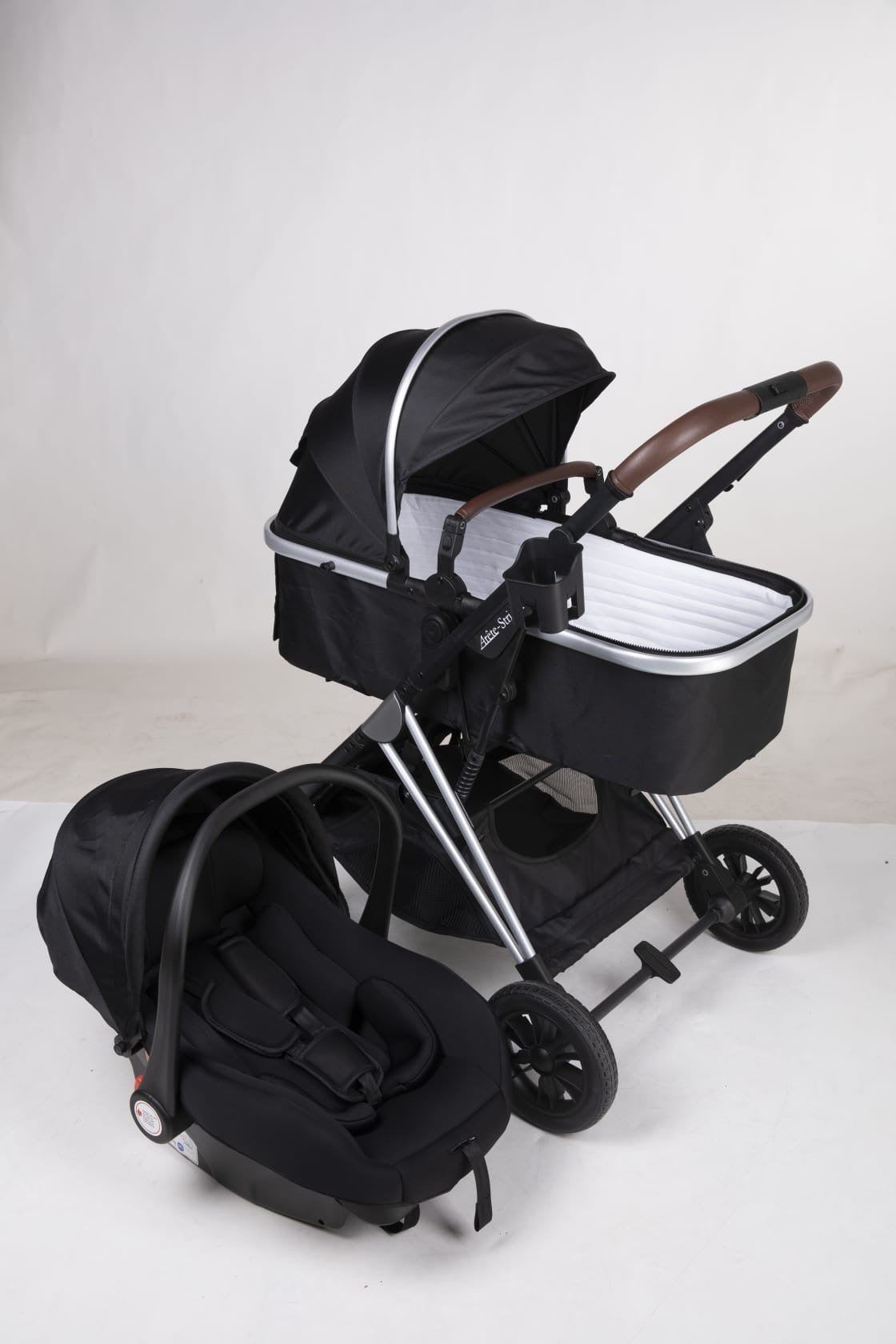 Arête Stridex 3-in-1 travel system in black with capsule